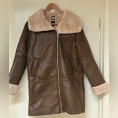 Size S Never Worn, New Without Tag Very Warm Beautiful Coat Chic Brown Shearling Outerwear, Brown Fur Coat With Faux Fur Lining For Work, Zara Brown Long Coat, Brown Long Coat With Faux Fur Lining, Beige Leather Outerwear With Faux Fur Lining, Brown Outerwear With Faux Fur Trim For Work, Zara Beige Outerwear With Faux Fur Lining, Zara Faux Fur Outerwear With Fur Trim, Zara Faux Fur Outerwear