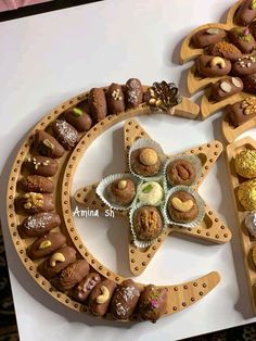 an assortment of desserts arranged in the shape of a star