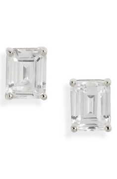 Up the shine of everyday ensembles with sterling silver earrings featuring emerald-cut cubic zirconia. 1/4"W x 1/4"L Sterling silver/14k-gold plate or platinum plate/cubic zirconia Imported