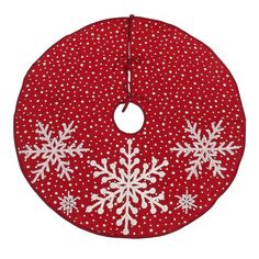 a red and white christmas ornament with snowflakes