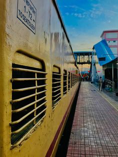 the side of a train parked at a station