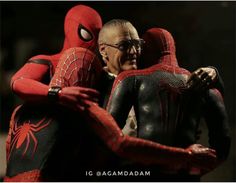 the spider - man is hugging his friend in front of him