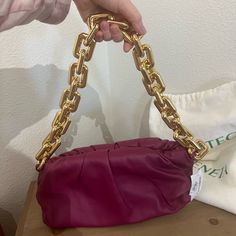 Size Info 11 1/2"W X 6"H X 4"D. (Interior Capacity: Small.) 9 1/2" Strap Drop. 2.0lb. Hide Details & Care Bottega Veneta Updates Its Cult Leather Bag With A Chunky Chain Strapeach Link Is Sculpted Individually Before It's Assembled And Polished By Master Jewelers. A Magnetic Frame Enveloped In Folds Creates The Soft, Voluminous Shape, Combining The Brand's Heritage Craftsmanship With A Contemporary Sensibility. Magnetic Frame Closure Chain Shoulder Strap Leather Made In Italy Designer Handbags M Evening Shoulder Bag With Chain Pouch, Formal Pouch Shoulder Bag With Chain, Formal Chain Pouch Shoulder Bag, Bottega Veneta Hobo Bag, Bottega Veneta Handbag, Bottega Veneta Cassette, Magnetic Frame, Bottega Veneta Bags, Bottega Veneta Shoulder Bag