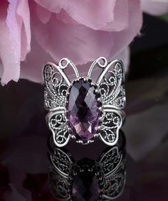 Elevate your jewelry collection with our stunning handmade Filigree Art Silver Butterfly Ring featuring an Amethyst Gemstone, the February birthstone. Crafted from 925 sterling silver, this timeless cocktail ring is both delicate and eye-catching, with a ring face length of 0.80 inches and a width of 0.70 inches. The amethyst gemstone is a 7x14 mm double-sided faceted checkboard oval cut, adding a touch of elegance to this already stunning piece. Plus, the metal embroidery filigree is oxidized a Metal Embroidery, Silver Butterfly Ring, Floral Filigree, Art Butterfly, Filigree Jewelry, Art Women, Butterfly Ring, Statement Ring Silver, Sterling Silver Filigree