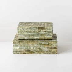 two pieces of woven material sitting on top of each other