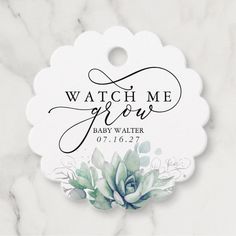 a white tag with the words watch me grow and an image of a succulent