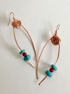 "Looking for a fun pair of earrings! You just found them in these hammered copper earrings with beautifully handcrafted copper rosettes that set the stage for the turquoise and red glass beads! Love the look of hammered copper! Each rosette is formed free style making each one so unique, no two are alike. * Measures 3\" in length * Measures 1\" in width * Rosettes measure 1/2\" round Looking for something a little different? This is it!" Jewelry Magic, Copper And Turquoise, Hammered Copper Earrings, Hammered Jewelry, Valley Village, Silver Choker Necklace, Chunky Jewelry, Wire Work Jewelry, Work Jewelry