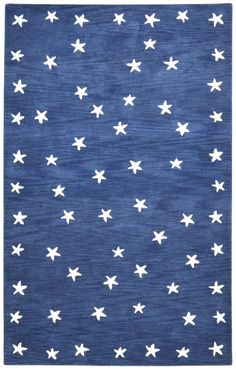 a blue rug with white stars on it