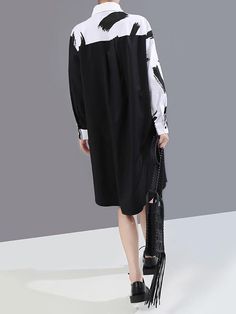 Sku CY-!64478 Material Polyester Style Loose , Long Sleeves Feature Printing , Split-joint Neckline Lapel Occasion Urban , Original Creation Seasons Spring , Autumn Type Midi Dresses Color BLACK WHITE Size FREE SIZE Model's weight: 49kg Model's height: 168cm(66.14inches) Model's bust: 86cm(33.86inches) Model's waist:66cm(25.98inches) Please consult the size chart we provide for this item's measurements to help you decide which size to buy.Please note: There may be 1-3cm differ due to manual measurement. size Bust Waist Shoulder Sleeve Length FREE SIZE 43.31 47.24 17.72 21.26 38.19 Black Long Sleeve Oversized Midi Dress, Black Oversized Long Sleeve Midi Dress, Black Long Sleeve Midi Dress For Work, Black Shift Midi Dress For Fall, Oversized Black Spring Dress, Black Shift Midi Dress For Spring, Black Shift Midi Dress Knee-length, Black Shift Midi Dress, Black And White Long Sleeve Summer Dress