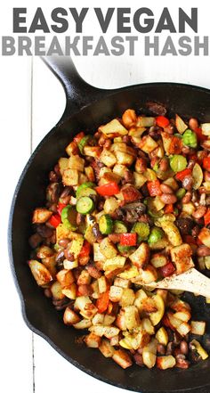 a skillet filled with beans and vegetables on top of a white wooden table next to the words easy vegan breakfast hash browns