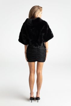 Cropped fur coats are our muse this season. Made of high-quality, environementally-friendly fur fabric, this chic coat is a perfect addition to your wardrobe. Its cropped design adds playfulness while the plush material adds warmth. Faux eco-friendly fur Cropped design Buckle included Dry clean only Chic Coat, Fur Fabric, Fur Fabrics, Fur Coats, Coat Black, Caicos Islands, Pitcairn Islands, Turks And Caicos Islands, Bosnia And Herzegovina