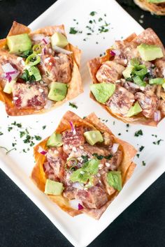 small appetizers with meat and vegetables on a white plate