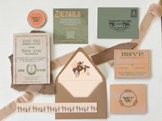 an assortment of wedding stationery items including envelopes, cards, and other things