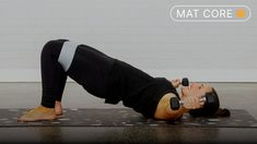 a woman doing a plank exercise on a mat with the words mat core above her