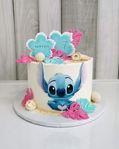 a birthday cake decorated with an image of stitchy from the disney movie, stitch