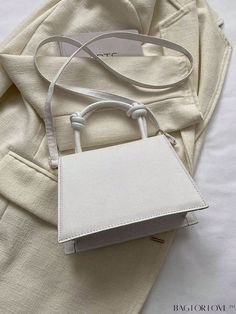 BagForLove - Elegant White Square Flap Bag - Mini, Minimalist Design Product Description Color White Details Lace Up Type Square Bag Bag Size Mini Strap Type Top Handle Closure Type Flap Style Funky Coating 100% Polyurethane Composition 100% Polyurethane Material PU Leather Size Chart INCH CM Strap Length Bag Length Bag Width Bag Height Handle Height 47.2 inch 7.9 inch 2.8 inch 5.5 inch 3.5 inch Strap Length Bag Length Bag Width Bag Height Handle Height 120 cm 20 cm 7 cm 14 cm 9 cm Details Pictu Simple White Shoulder Bag With Adjustable Strap, Versatile White Square Satchel, White Minimalist Shoulder Bag With Adjustable Strap, Minimalist White Shoulder Bag With Adjustable Strap, White Rectangular Shoulder Bag Solid Color, White Rectangular Satchel With Single Handle, Minimalist White Square Bag, White Solid Color Rectangular Shoulder Bag, White Minimalist Shoulder Bag With Double Handle