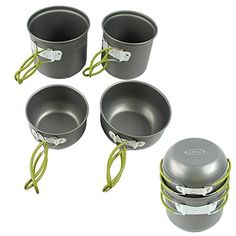 four pots and pans are shown with the lids open on each one, which is connected to a cord