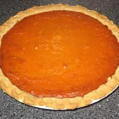 an uncooked pie sitting on top of a counter