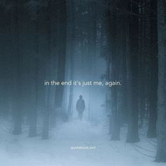 a person standing in the middle of a forest on a foggy day with an inspirational quote