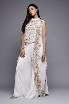 White cape with floral cutwork embroidery. Paired with an embroidered inner top and sharara. - Aza Fashions Cape Sharara, White Cape, Diana Penty, Cutwork Embroidery, Women Kurta, Luxury Sale, Sharara Set, Fashion App, Set Women