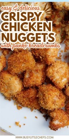 crispy chicken nuggets with parmesan breadcrumbs on a white plate