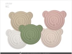 four teddy bears made out of different colors and shapes, each with a bear's head in the center