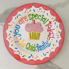 a paper plate that says, you are special to the quick family with cupcakes and sprinkles on it