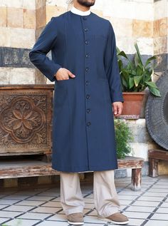 Round neckline without collar Buttoned opening Left breast welt pocket 2 waist welt pockets Fully lined Item Code: mC4801 Model is 184cm (6 feet) and wearing size L Traditional Fitted Outerwear For Work, Formal Cotton Nehru Jacket With Long Sleeves, Formal Long Sleeve Cotton Nehru Jacket, Cotton Nehru Jacket With Pockets, Cotton Nehru Jacket With Long Sleeves And Pockets, Cotton Nehru Jacket With Pockets And Long Sleeves, Traditional Fitted Nehru Jacket With Pockets, Classic Nehru Jacket For Semi-formal Occasions, Classic Nehru Jacket With Long Sleeves For Semi-formal Occasions