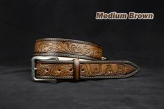 "Sheridan Tooled Leather Belt, Hand crafted Mens Women leather belt If you did not specify the initials font when ordering, then by default we make font # 3 It's 100 % Handmade The belt is made of vegetable tanned leather. Belt sewn on length, leather is dyed by hand. Edges of each the belt are smoothed and treated with high quality special paint. The surface and edges of the belt are treated with a special finish coat. This belt is made by hand, which gives it a personality. Each subsequent bel Leather Belts Western, Mens Leather Belt, Initial Fonts, Custom Leather Belts, Tooled Leather Belts, Mens Western, Handmade Leather Belt, Cowboy Belt, Handmade Belts