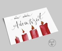 a card with three red candles on it and the words, une sublime autrent '