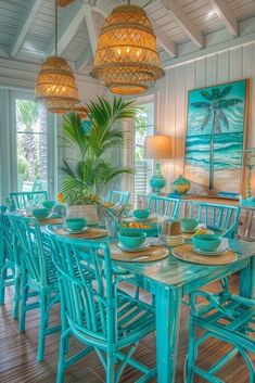 the dining room table is set with blue chairs and place settings for six people to eat