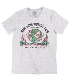 In 1964, the New York World's Fair took the city by storm, showcasing a dazzling array of futuristic wonders and cultural marvels. At the heart of it all stood the iconic Unisphere, a colossal globe symbolizing global unity and progress. The fair was a kaleidoscope of innovation, entertainment, and international flair, leaving an indelible mark on the cultural landscape of New York City. Commemorate this historic event by picking up a vintage tee shirt that beautifully captures the spirit of the Vintage Tee Shirts, The Fair, Graphic Apparel, Vintage Tee, Instagram Shop, Vintage Tees, Tee Shirt, York City