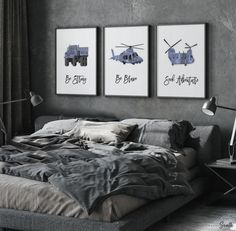 two paintings on the wall above a bed in a room with grey walls and furniture