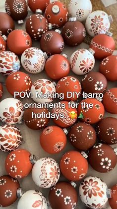 some red and white decorated eggs on a table with the words pov making diy barro ornaments for the holidays