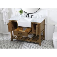 a bathroom vanity with drawers and a sink