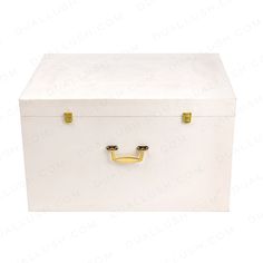 a white box with gold handles and handle on the top is sitting in front of a white background