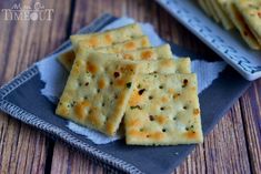 some crackers are sitting on a blue and white plate