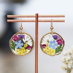 Multi Color Pressed Flowers Earrings, Forget Me Not Jewelry, Mother's Day Gift, Flower Earrings for Women, Handmade Jewelry, Resin Earrings All flowers have been carefully placed in resin.  -------Necklace------- https://www.etsy.com/listing/498401088/ --------------------------- Size: approximately 23mm in diameter, gold plated bezel Gold FILLED French Hook Earwire Nature-inspired Round Flower Earrings, Birth Flower Dangle Earrings For Jewelry Making, Nature-inspired Round Pressed Flowers Earrings, Mother's Day Flower Charm Earrings, Mother's Day Round Earrings With Flower Charm, Mother's Day Pressed Flower Drop Earrings, Floral Earrings With Pressed Flowers For Mother's Day, Handmade Flower Shaped Earrings For Mother's Day, Origami Hand