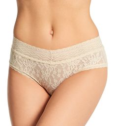 High rise hipster panty is sheer floral lace with 4-way stretch for a flexible fit that moves with you. Made of nylon and spandex with cotton crotch liner. Panty stays in place with a wide stretch lace waistband. Leg openings have stretch lace sewn along the edge. Floral lace is see-through for a sexy touch. Lace stretches in four directions for a comfortable fit. High rise. Seamless bottom. Moderate, "cheeky" rear coverage. Inner waist has fabric/care info tag. Cotton crotch liner. Please note: Beige Lace Brief Bottoms, Stretch Bottoms With Delicate Lace In Short Length, Beige Lace Short Bottoms, Beige Stretch Bottoms With Delicate Lace, Fitted Beige Lace Bottoms, Beige Lace Bottoms With Delicate Details, Stretch Lace Brief Bottoms, Stretch Lace Bottoms With Short Length, Stretch Lace Bottoms In Short Length