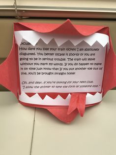 an origami box with a poem written on it