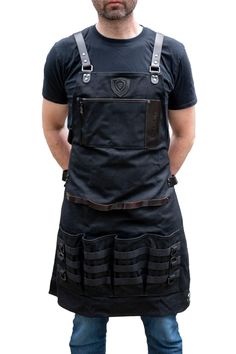 a man wearing an apron with multiple pockets