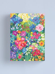 colorful flowers on a blue background canvas print