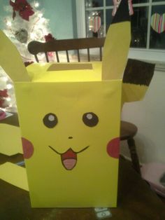 a paper bag with a pikachu face on it