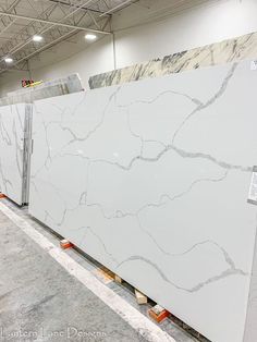 a large white marble slab in a warehouse