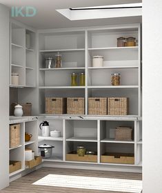 an organized pantry with white shelves and wicker baskets