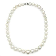 Description: This lovely 19" princess-length necklace strand has 37 round cultured South Sea pearls brought together by another pearl and an 18-karat white gold clasp. They are beautifully matched in color and luster. They graduate in size from 10mm to 14mm down to the center, and the clasp is made of 18kt white gold and a pearl for the clasp to insert into for a seamless transition. This pearl necklace strand is prominent, projecting elegance and natural beauty. These are pre-owned and in Like New condition. Specs: Material info: Solid 18Kt (750) White Gold Clasp with Pearl for InsertTotal Gram Weight: 89.9 Grams Pearl Information: 37 Round Cultured South Sea PearlsColor: White with Pink OvertonesShape: RoundLuster: Medium to HighGrade: A to AASize: 10.00mm Graduates Up to 14.00mm Marking Graduation Necklace, Length Necklace, Seamless Transition, Sea Pearl, South Seas, South Sea Pearls, Sea Pearls, Pearl Types, Natural Beauty