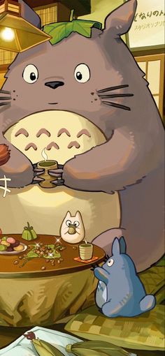 an animated image of a totoro sitting at a table with food on it