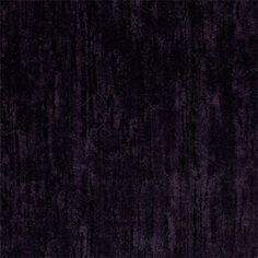 an area rug that is very dark purple