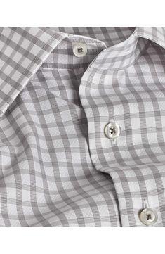 A classic check pattern smartens the look of this versatile dress shirt made from cool and comfortable cotton with adjustable button cuffs. 31 1/2" length Spread collar Rounded, adjustable button cuffs 100% cotton Machine wash, line dry Imported Plaid Cotton Shirt For Office, Classic Plaid Shirt With Placket, Gingham Cotton Dress Shirt For Work, Plaid Shirt With Placket For Workwear, Cotton Gingham Dress Shirt For Work, Classic Plaid Dress Shirt For Work, Plaid Cotton Dress Shirt With Spread Collar, Plaid Cotton Dress Shirt For Business Casual, Plaid Spread Collar Shirt For Business Casual