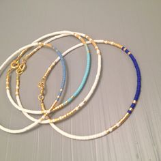 Everyday bracelet tiny gold bracelet gold bead bracelet Every Bead Friendship Bracelet, Stacked Beaded Bracelets, Bracelets Inspiration, Stack Bracelet, Friendship Bracelets With Beads, Blue Beaded Bracelets, Jewelry Advice, Everyday Bracelet, Bracelet Minimalist